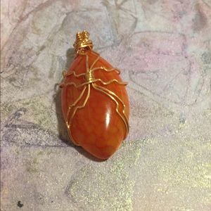 Wire wrapped pendant.